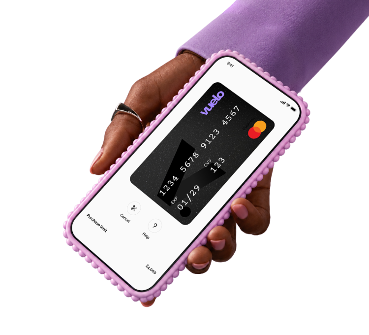 Hand holding a phone showing a Vuelo card in the Vuelo app