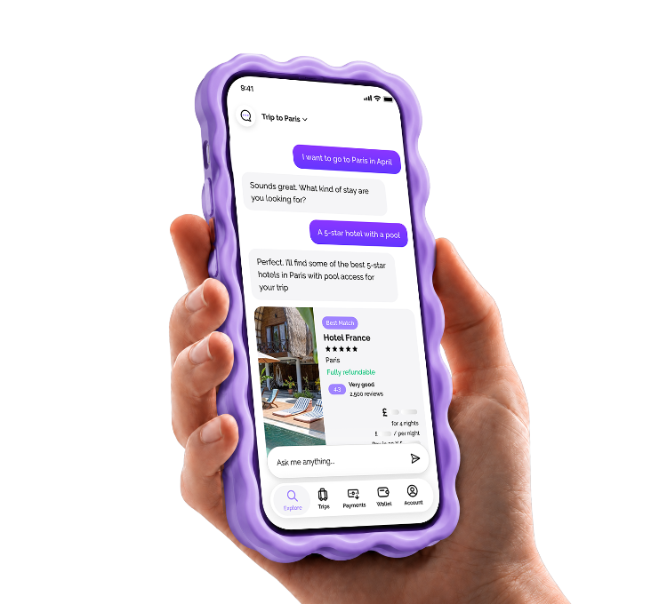 Hand holding a phone showing a conversation with Voya AI about hotels in Paris