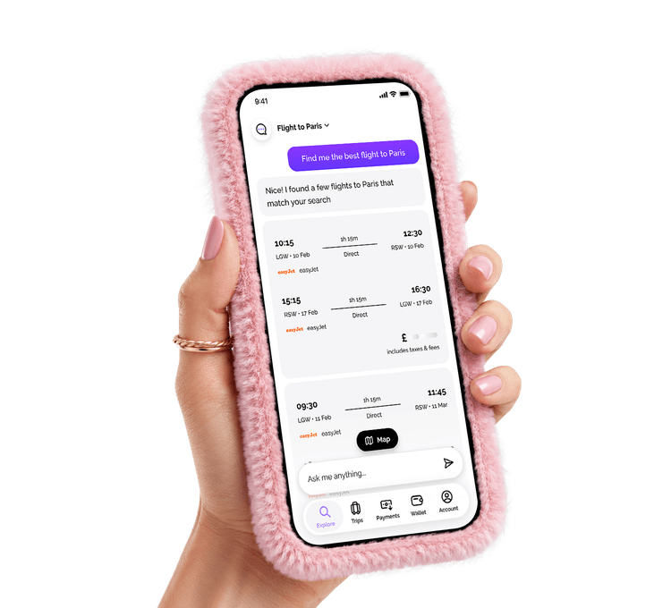 Hand holding a phone showing Vuelo AI flight search results to Paris