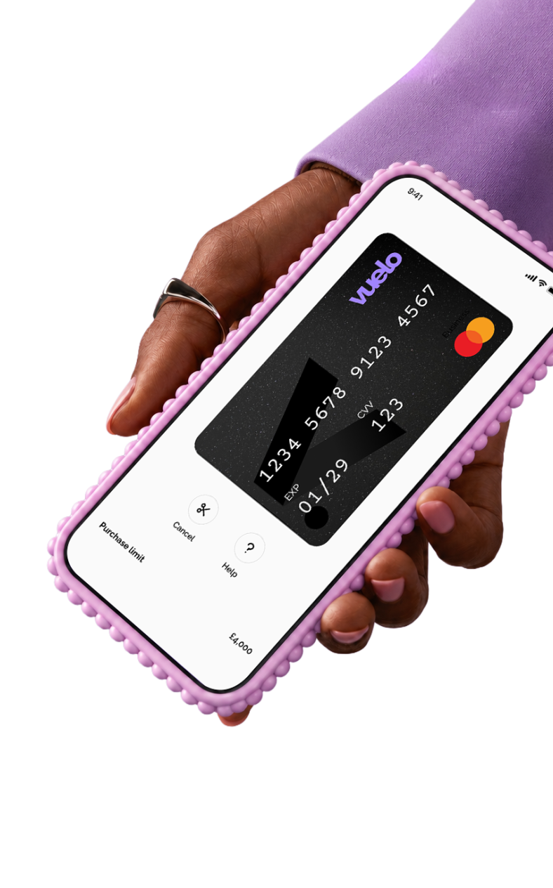 Hand holding a phone showing a Vuelo card in the Vuelo app