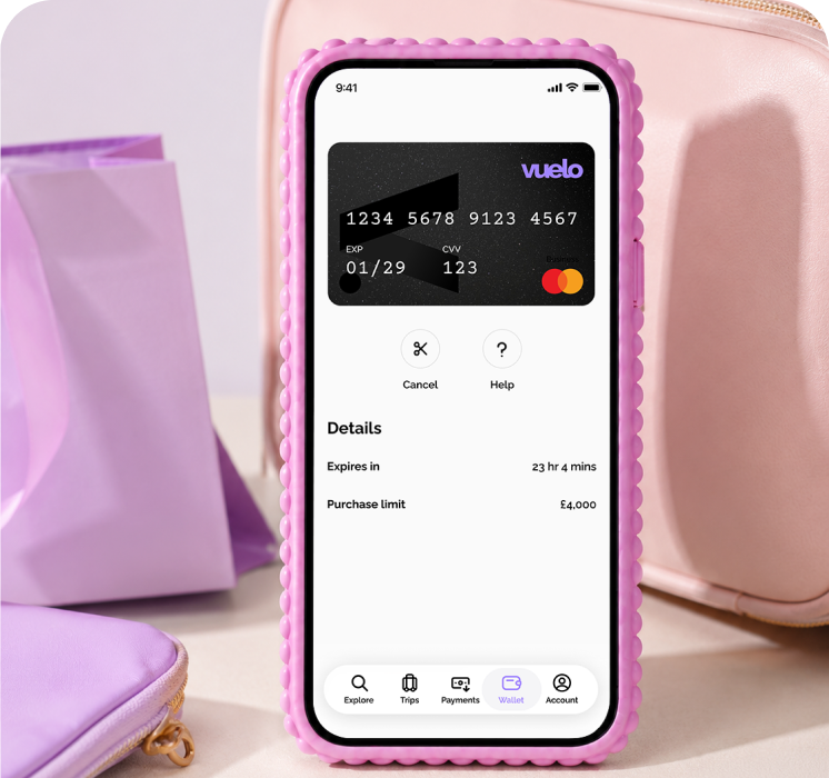 Pink-cased phone showing the Vuelo One Time Card details