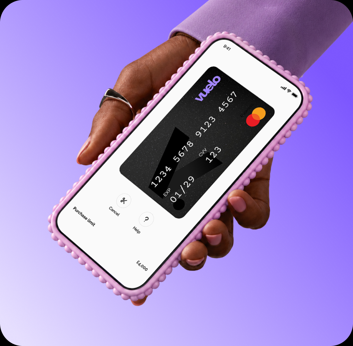 Hand holding a phone showing a Vuelo One Time Card